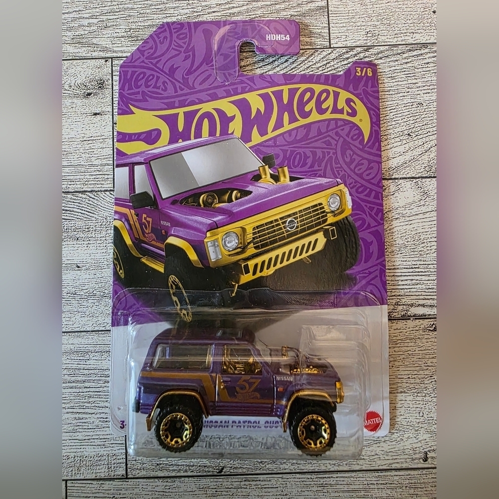 Mattel Hot Wheels Purple and Gold SUV